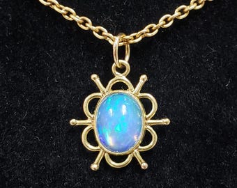 14k Gold Ethiopian Opal Pendant: Minimalist Oval Cabochon (9x7 mm)