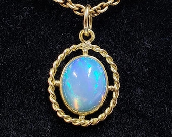 14K Gold Ethiopian Opal Pendant: Minimalist Rope Texture