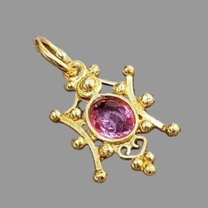 artistic pink sapphire pendant in solid gold handmade jewelry