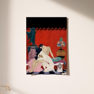 George Barbier’s romantic nude illustration displayed in soft natural light, casting diagonal shadows across the wall. The sensual Art Deco scene of two women is set in a vivid red interior with floral and Greco-Roman elements, making this print a statement piece in a serene, sunlit space.