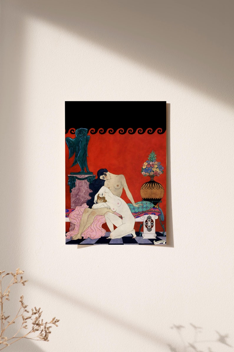 George Barbier’s romantic nude illustration displayed in soft natural light, casting diagonal shadows across the wall. The sensual Art Deco scene of two women is set in a vivid red interior with floral and Greco-Roman elements, making this print a statement piece in a serene, sunlit space.