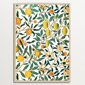 William Morris Print shows one of his pattern designs with various fruits such as lemons and other cirtrus fruits. Branches, various leaves, fruits and some small flowers are arranged on a white background.