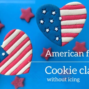 May include: Two heart-shaped cookies decorated with red, white, and blue icing to resemble the American flag. The text "American flag Cookie class without icing" is below the cookies.