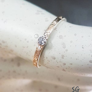 Diamond two tone 14 karat yellow and white gold hand engraved ring