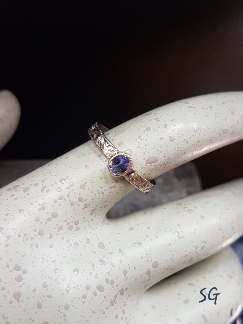 Tanzanite ring. Solid 14 karat two tone white gold with yellow gold setting image 4