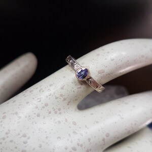 Tanzanite ring. Solid 14 karat two tone white gold with yellow gold setting image 3