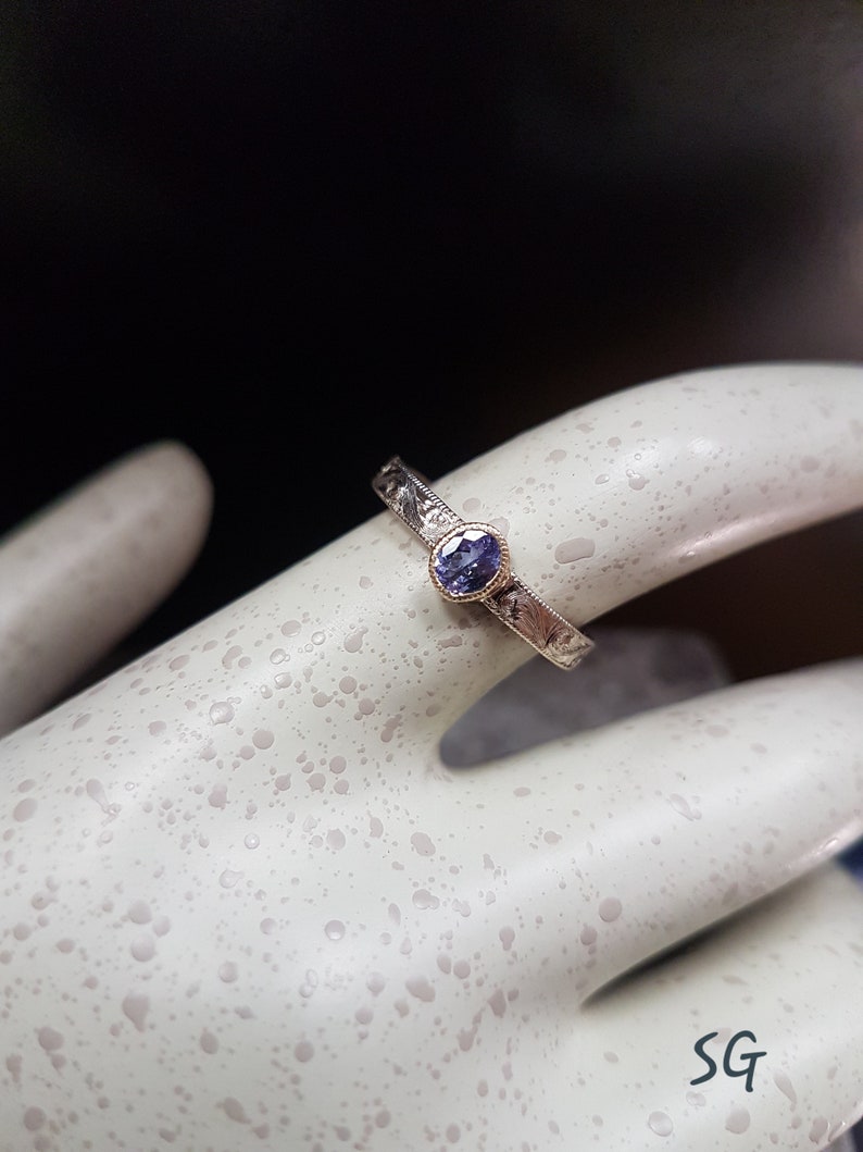 Tanzanite ring. Solid 14 karat two tone white gold with yellow gold setting image 3