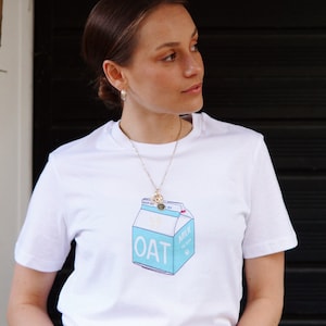 Camiseta 100% orgânica ‘sem laticínios’ | Caixa de Leite de Aveia Terra Planeta Clima | Vegan Fair Wear | Camiseta Eco Sustentável