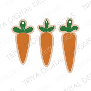 May include: Three orange carrot-shaped cutouts with green tops. The carrots are outlined in brown and have a hole at the top for hanging.