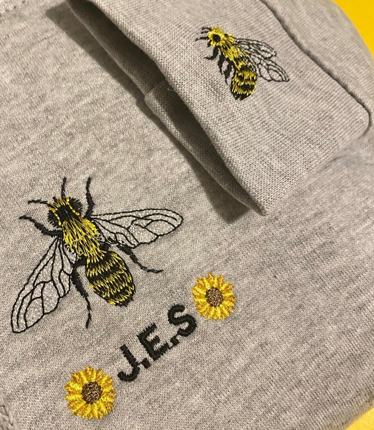 Embroidered bee sweatshirt deals