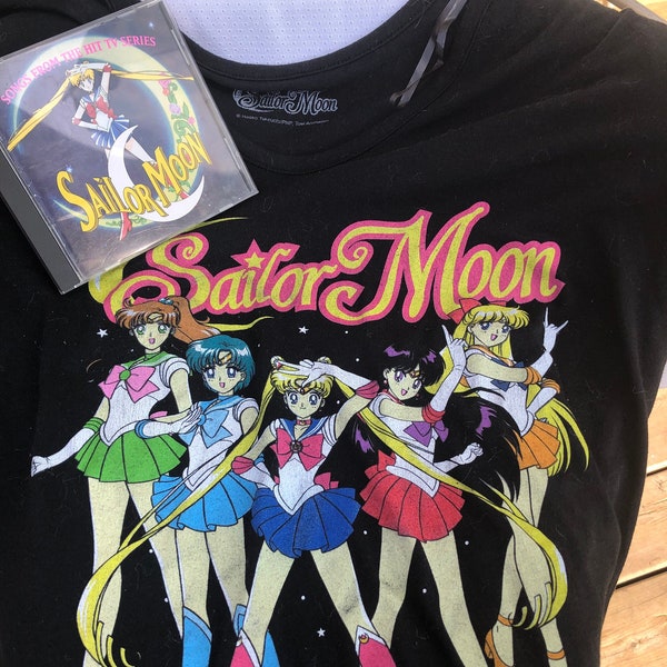 Lot de CD et t-shirts Sailor Moon