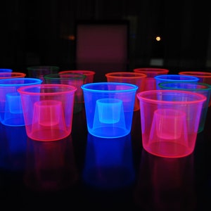 DirectGlow 4 Ounce UV Blacklight Reactive Soft Plastic Bomber Cups Jager Bomb Shot Glasses Glow Party