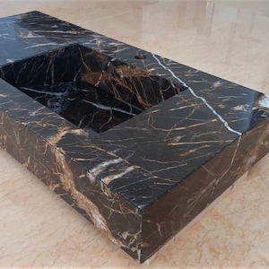 Stunning Galaxy brown marble countertop with basin