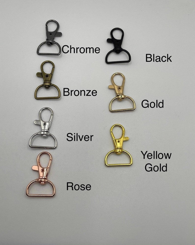 May include: Assortment of metal swivel clasps in various finishes, including chrome, black, bronze, gold, silver, rose gold, and yellow gold.