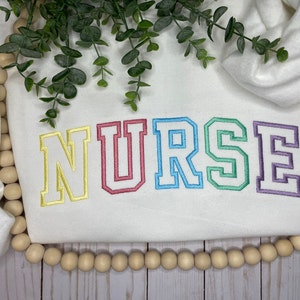 Pastel Embroidered Nurse Outline Sweatshirt, Nurse Sweatshirt, Nurse Embroidered Sweatshirt, Embroidered Sweatshirt