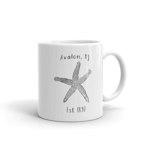 May include: White ceramic mug with a black and white illustration of a starfish and the text "Avalon, NJ Est 1892"