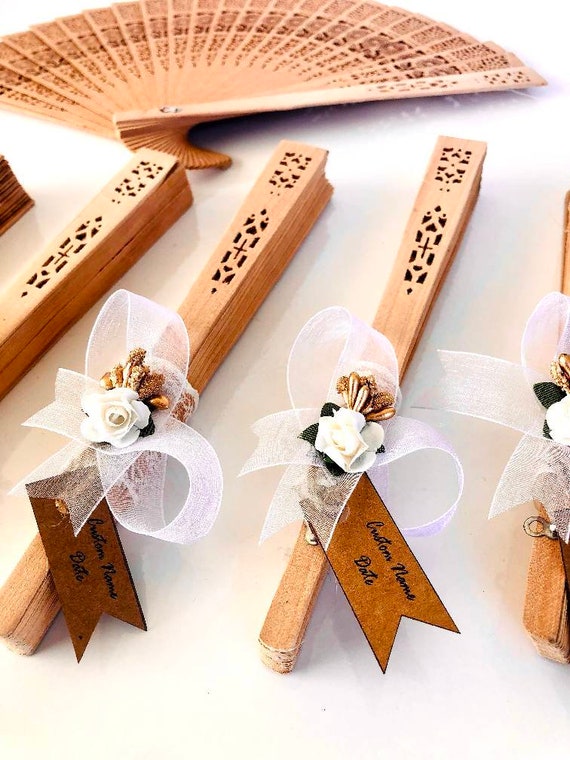 Kraf - Our wedding fans will allow your guests to cool off on those long,  warm days during your wedding ceremony!👰🏻🤵Our fans are offered in  sandalwood, and silk, and make the loveliest