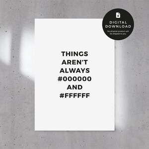 May include: A white poster with the text "THINGS AREN'T ALWAYS #000000 AND #FFFFFF" in black. A black circle with the words "DIGITAL DOWNLOAD" is in the upper right corner. The poster is against a grey wall.
