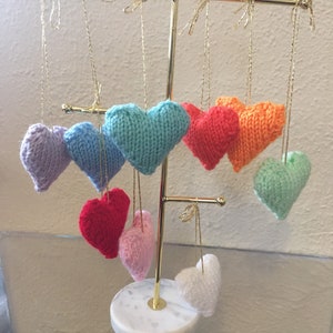 Hanging knitted love hearts