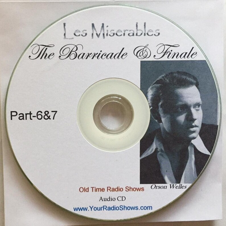 K&ouml;nnte beinhalten: Eine wei&szlig;e Audio-CD mit dem Text "Les Mis&eacute;rables The Barricade & Finale" und "Part-6&7". Sie enth&auml;lt ein Schwarz-Wei&szlig;-Bild von Orson Welles. Die CD ist mit "Old Time Radio Shows" und "Audio CD" beschriftet.