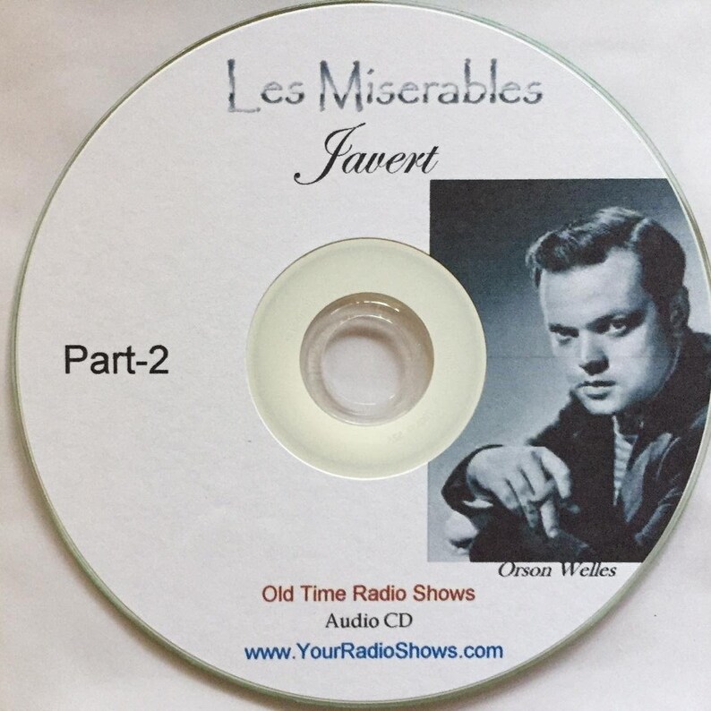 K&ouml;nnte beinhalten: Eine wei&szlig;e Audio-CD mit dem Text "Les Mis&eacute;rables Javert Part-2" und einem Schwarz-Wei&szlig;-Bild von Orson Welles. Die CD enth&auml;lt auch den Text "Old Time Radio Shows Audio CD".