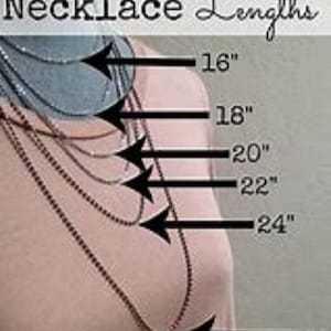 May include: A visual guide to necklace lengths, showing five different lengths from 16 inches to 30 inches. The necklaces are shown on a mannequin wearing a light pink shirt.