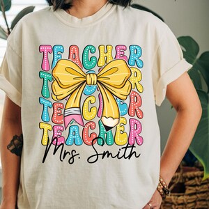Custom Coquette Teacher Name Pencil T-Shirt, Back To School Shirts, Cute Teacher Bow T-Shirt, First Day of School Tee, Teacher Appreciation