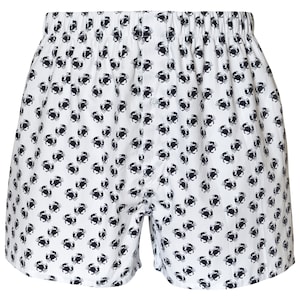 May include: White boxer shorts with a navy blue crab pattern.