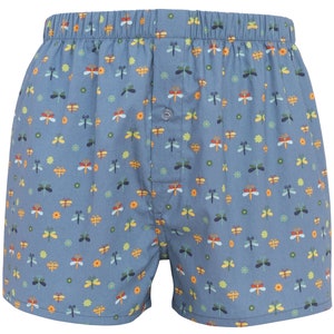 May include: Blue boxer shorts with an elasticated waistband and button closure. The shorts feature a pattern of colourful dragonflies and small flowers. The dragonflies are in shades of yellow, orange, green, and blue.