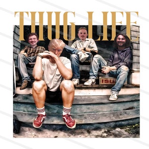 May include: Four men sitting on a wooden platform with the word "THUG LIFE" in gold letters above them. The men are wearing casual clothing and have different hairstyles. The platform is made of wood and has a weathered look.