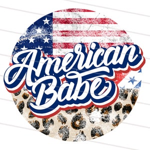 May include: A round graphic with a distressed American flag design, leopard print, and the text "American Babe" in a blue and red font.