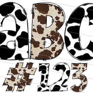 Puede incluir: Letras A, B, C y números 1, 2, 3 con estampado de vaca. Las letras y los números están delineados en negro y tienen un aspecto cosido.