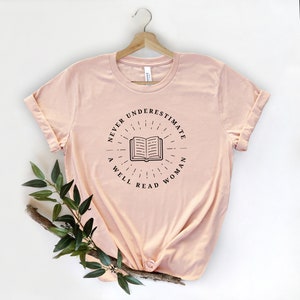 Never Underestimate a Well Read Woman Shirt Literary Tshirt Book Lover T Shirt Reading T-Shirt Library Tee Gift for Reader Shirt Heather Prism Peach