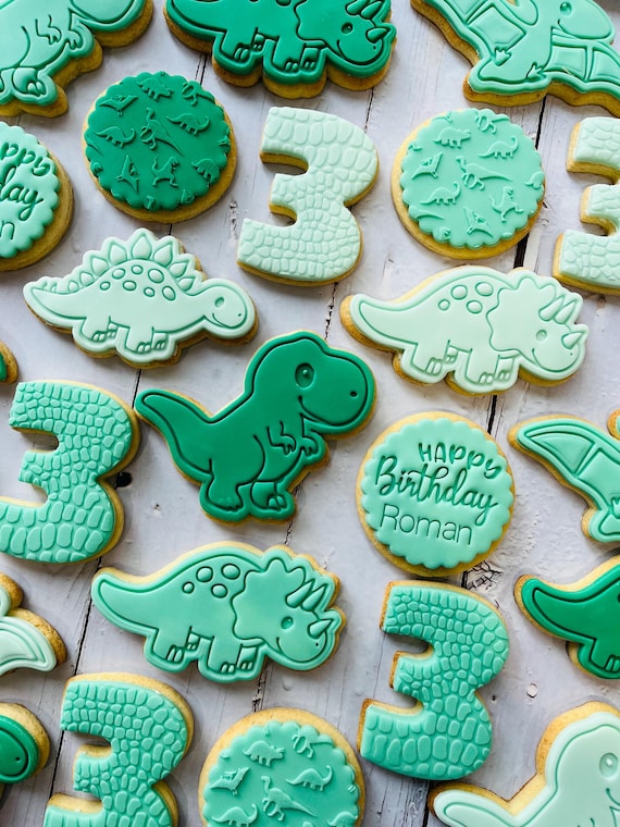 Dinosaur theme birthday party fondant iced sugar cookies individually wrapped