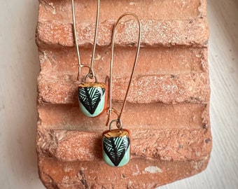 Delicate Ceramic Dangle Earrings With Detailed Black & Teal Patterns