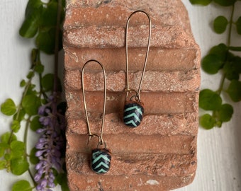 Ceramic Earrings with black and teal chevron patterns, 14 k gold hooks