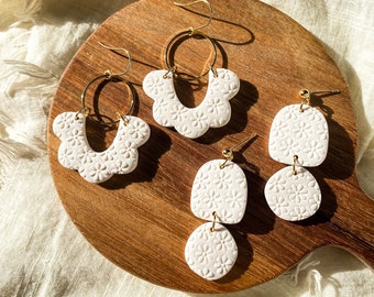 Limited edition daisy textured white  clay earrings
