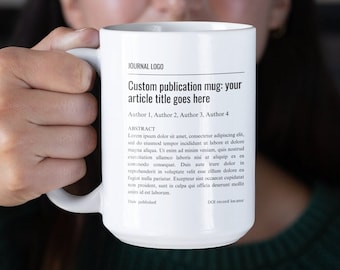 Publicatiemok als promotiecadeau voor afgestudeerde student