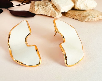 Contemporary wedding jewelry includes geometric ceramic earrings,Porcelain gold-dipped earrings,Wavy statement earrings white-off ceramic.