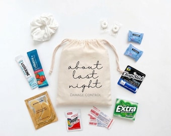 May include: A beige drawstring canvas bag with the black text "about last night DAMAGE CONTROL" surrounded by a white scrunchie, Listerine strips, strawberry Liquid IV, gold eye masks, a Shout wipe, Band-Aids, Extra gum, ChapStick, and mints.