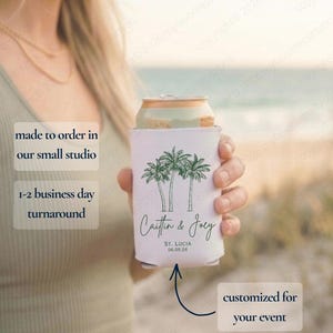 May include: A white can cooler featuring a green palm tree design and the names "Caitlin & Joey" with the date "06.05.26" printed on it. The text "customized for your event" is also visible. The cooler is designed to keep beverages cold.