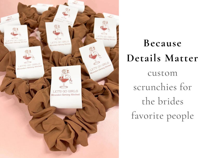 May include: A collection of brown fabric hair scrunchies, each featuring a white paper tag printed with a red graphic of a person in a wine glass and the text "LET'S GO GIRLS Miranda's Getting Hitched." The text "Because Details Matter" is visible.