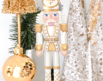 Metal Embossed Nutcracker , 12” X 4'' Warm White & Gold, Christmas