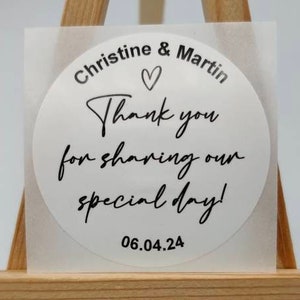 May include: White round sticker with black text that says "Christine & Martin" with a heart symbol, "Thank you for sharing our special day!" and "06.04.24".