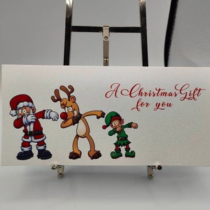Regalo di Natale con portafoglio di denaro natalizio, Babbo Natale che tampona, Regalo, Regalo in denaro, Carte regalo, Buoni Natale, Porta gratta e vinci, Porta biglietti della lotteria