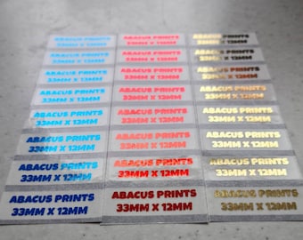 Brillo labial extra pequeño de 33 mm x 12 mm, brillo transparente laminado personalizado, bálsamo labial, etiquetas para pestañas, rectángulo, pegatinas promocionales de marca, brillo labial.