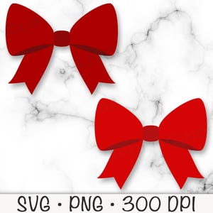 May include: Two red bows with a simple design. The bows are isolated on a white marble background.