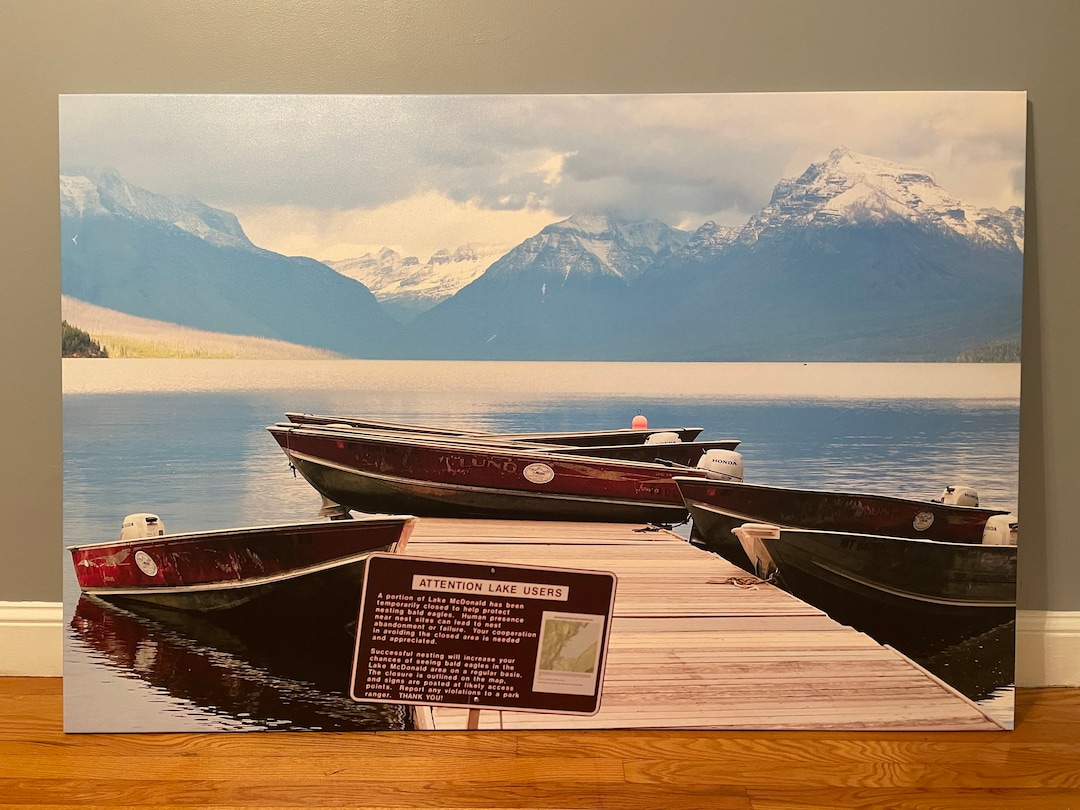 Boats on the Lake Dock Scenic Water Mountain View at Glacier National Park, Kalispell, Montana