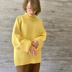 Yellow turtleneck sweater for women. Oversized nordic hygge sweater. Loose merino wool sweater. Fluffy hand knit sweater with high neck. image 1