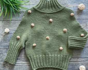 Oversized Girl Sweater With Mohair Pompoms. Fluffy Pompom